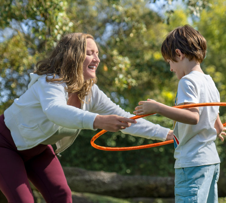 Woman playing with son Woman playing with son